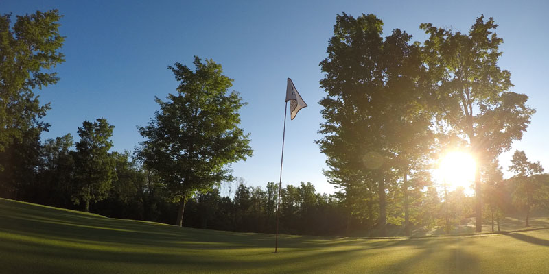 Photo of Par 4 Hole 16 at sunrise at Tamarack Golf Club in Oswego, NY.